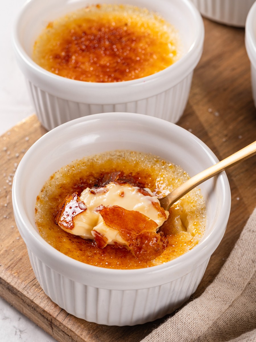 Under the crackle, vanilla creme brulee should be soft and spoonable, never rubbery or grainy.