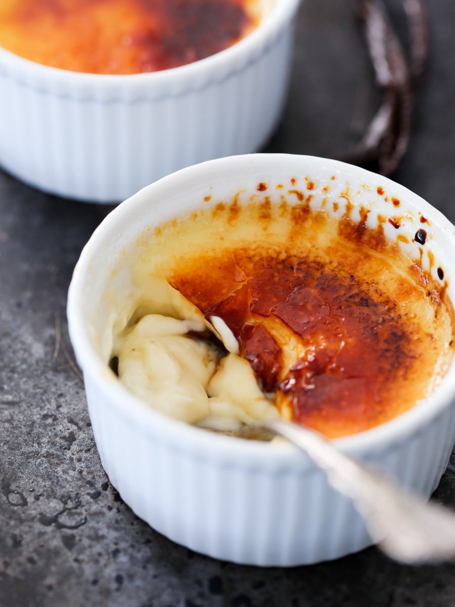That first crack is the whole reward of making vanilla creme brulee with real vanilla beans.