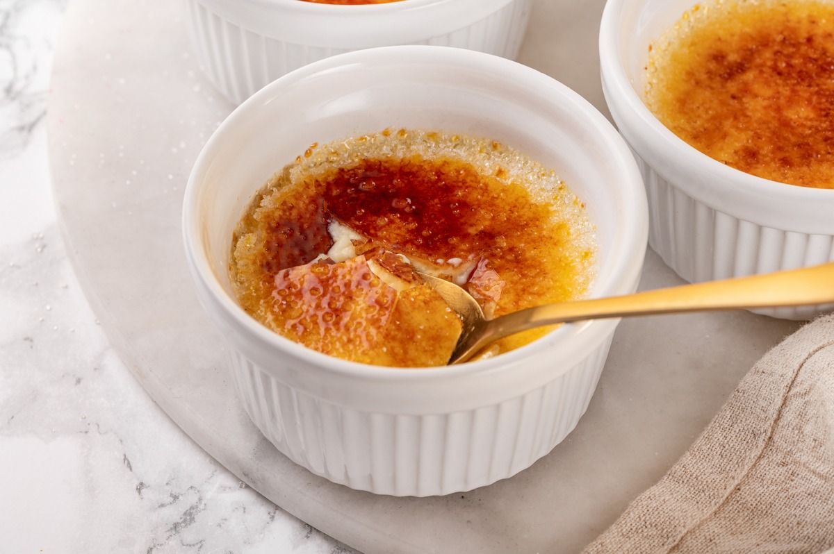 Bright marble and soft linen make vanilla creme brulee feel right at home at brunch.