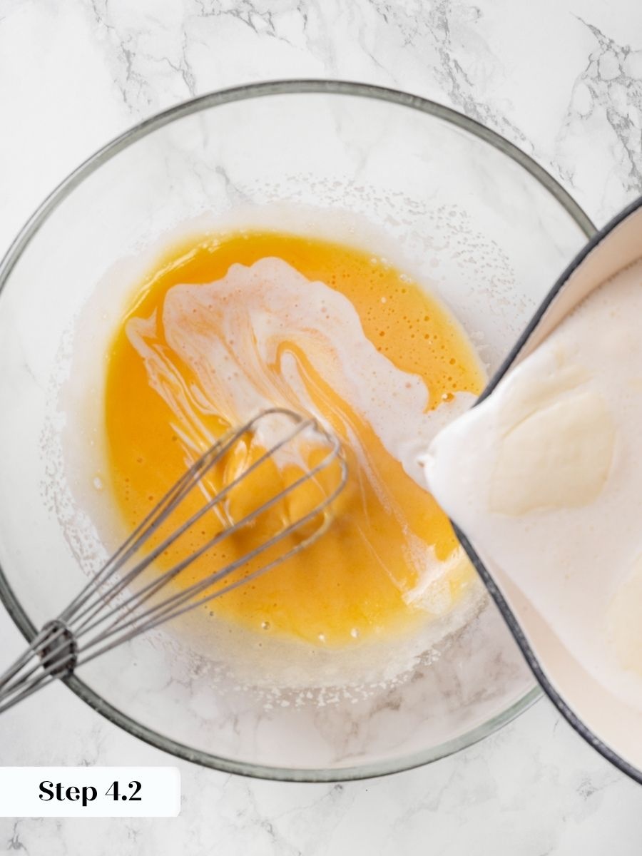 A slow, steady stream while whisking keeps the eggs from scrambling in vanilla creme brulee.
